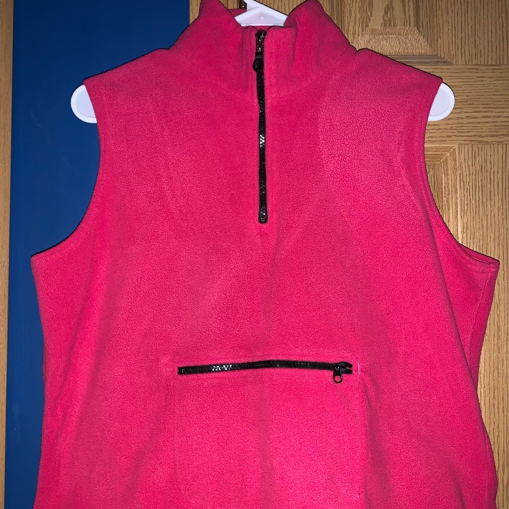 Pink quarter zip vest with a fanny pack pocket